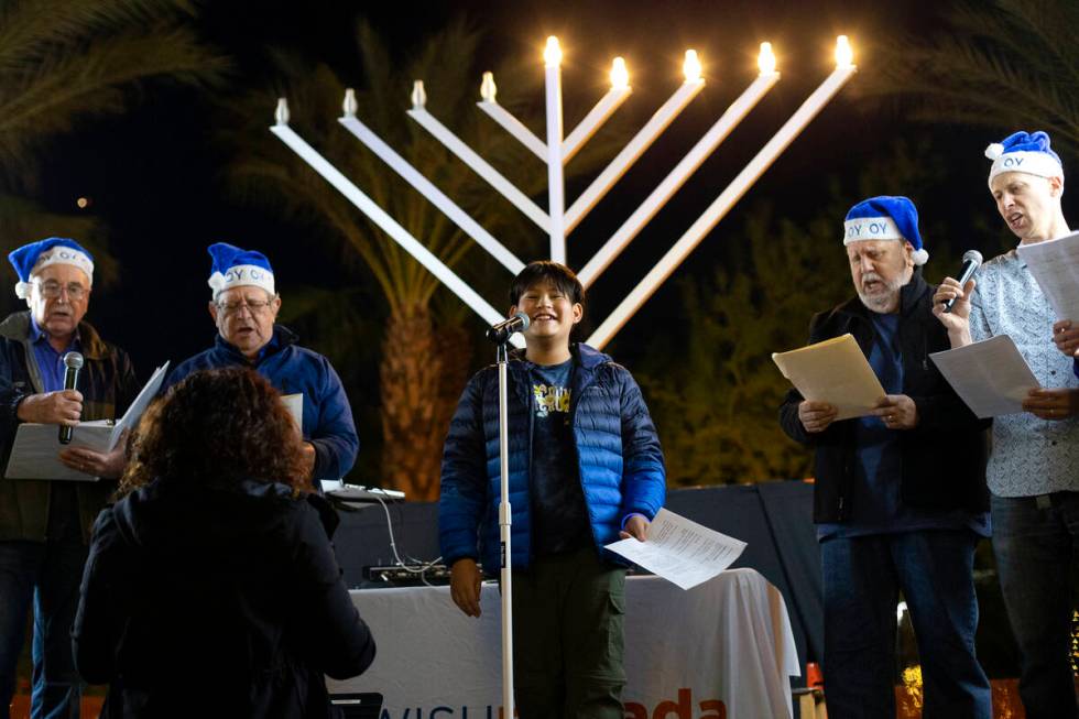 The Intergenerational Choir performs during the fourth night of Hanukkah celebration.